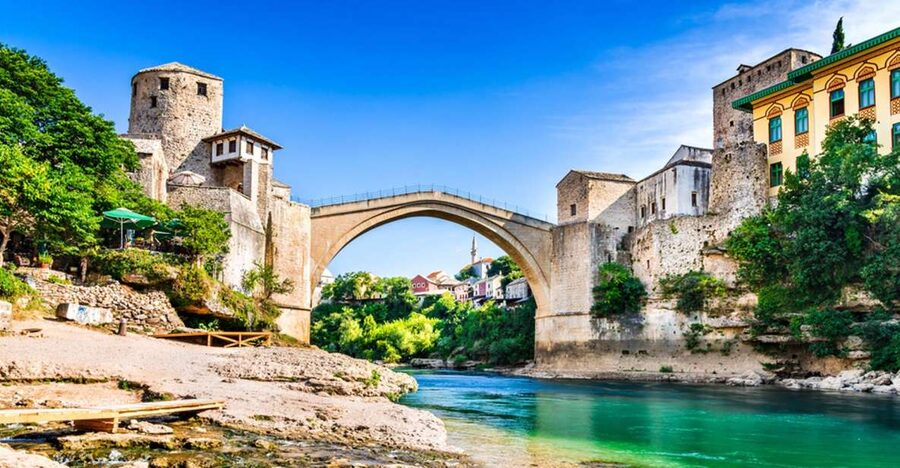 From Split and Trogir: Mostar Tour with Kravica Waterfalls - Three hours to eat, shop, and taste Mostar